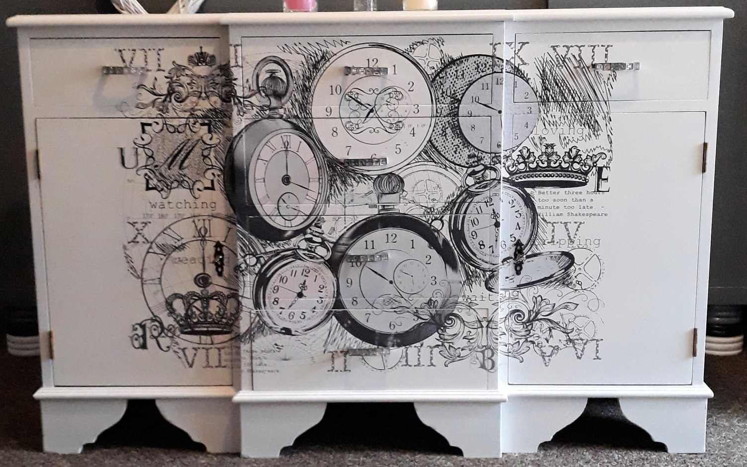 Handpainted sideboard painted white with stenciled clock detail